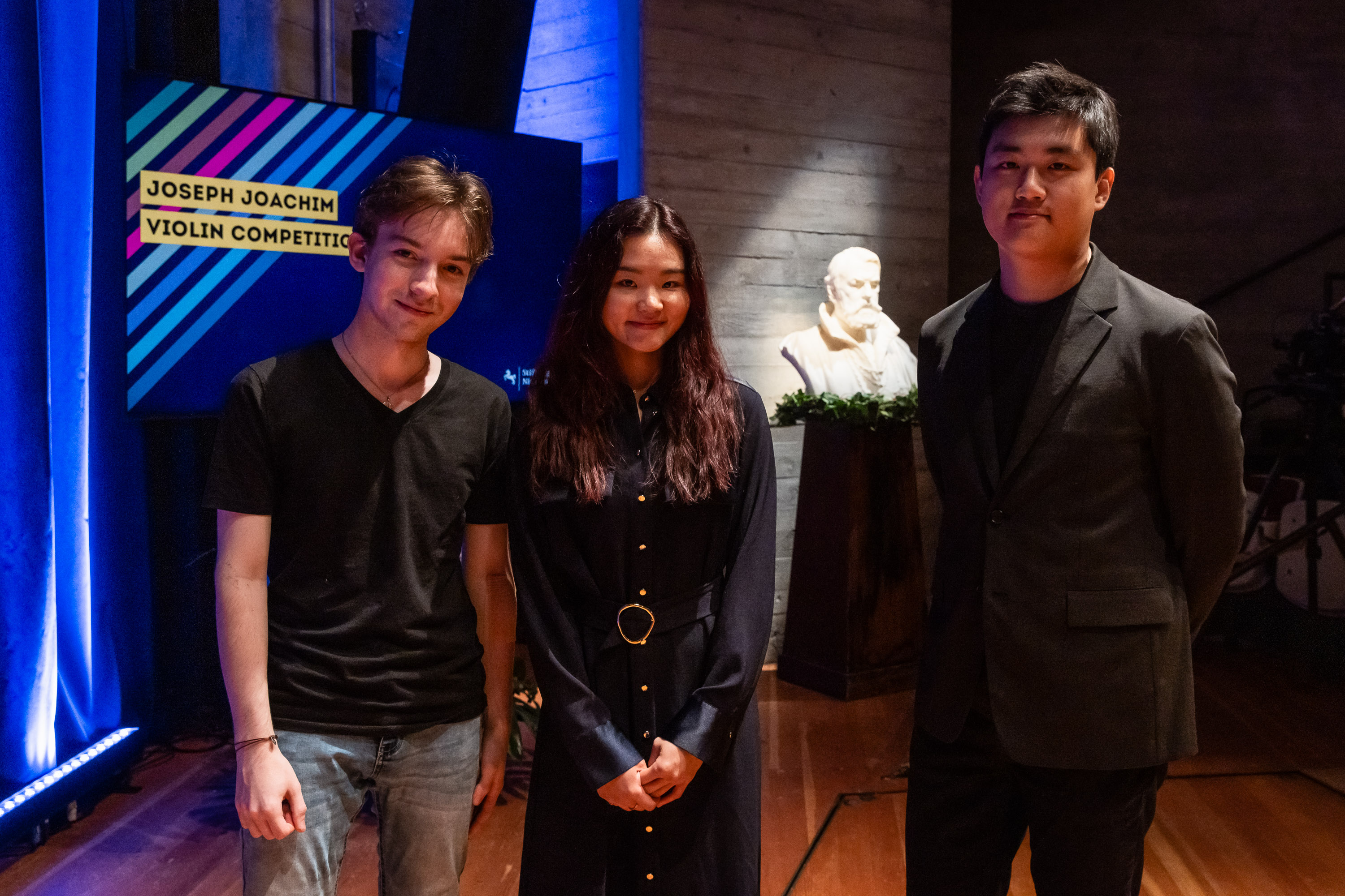 Die drei Finalist*innen des Joseph Joachim Violinwettbewerbs 2024: Jacques Forestier, Angela Chan und Kyumin Park